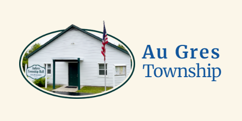 Au Gres Township Hall building with American flag