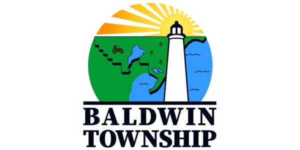 Logo of Baldwin Township featuring lighthouse and sun