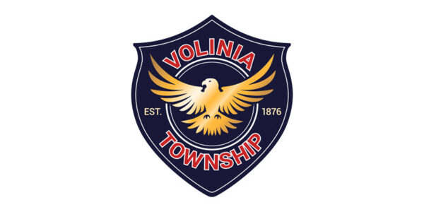 Volinia Township logo with eagle and shield, established 1876