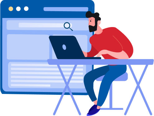 Person working on a laptop at a desk